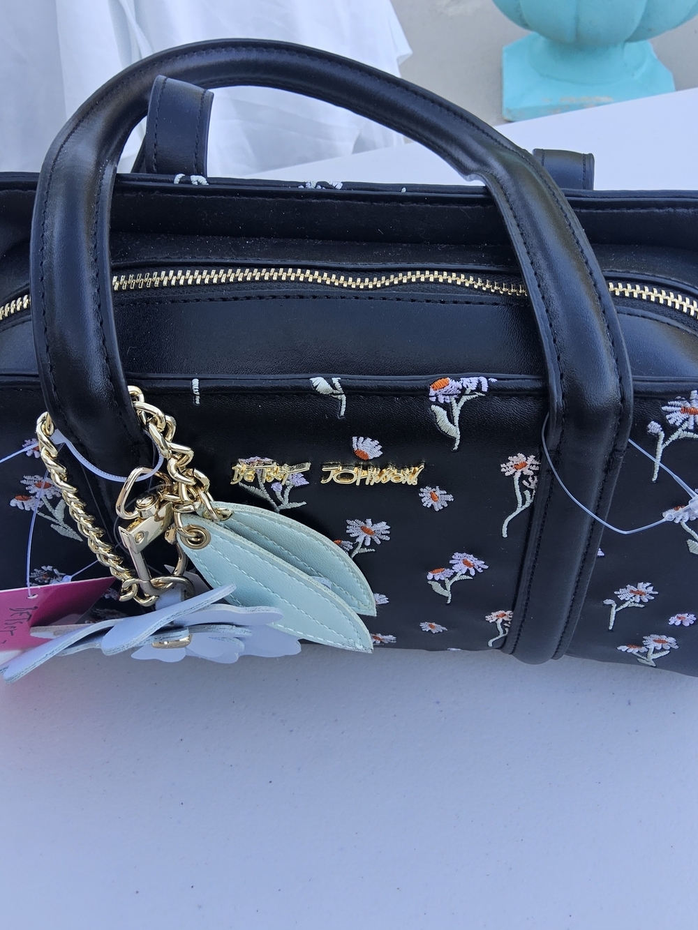 NWT-Betsey Johnson Black Floral Satchel with Light Blue Flower Charm - Picture 4 of 6